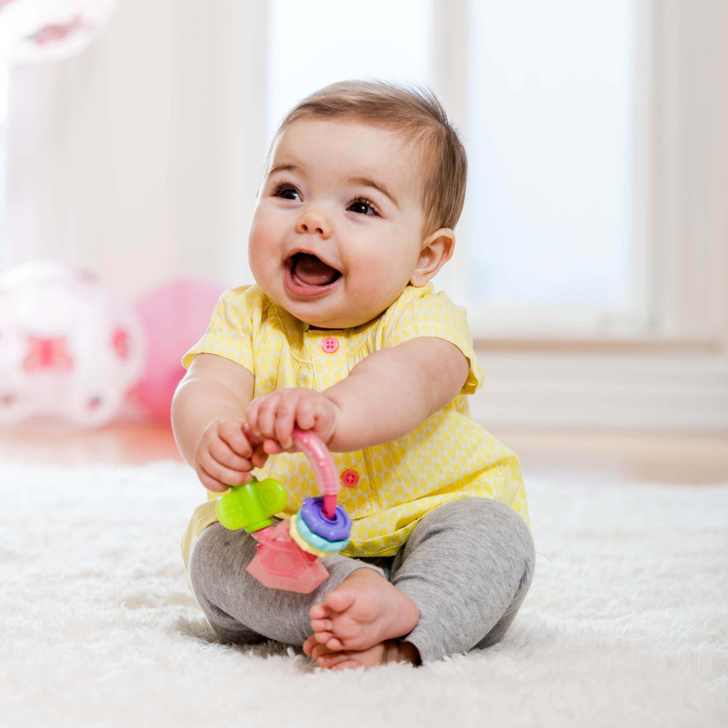 INFANTINO CHEW & PLAY RING TEETHER FOR BABY SUITABLE FROM 0 MONTHS-MULTICOLOR