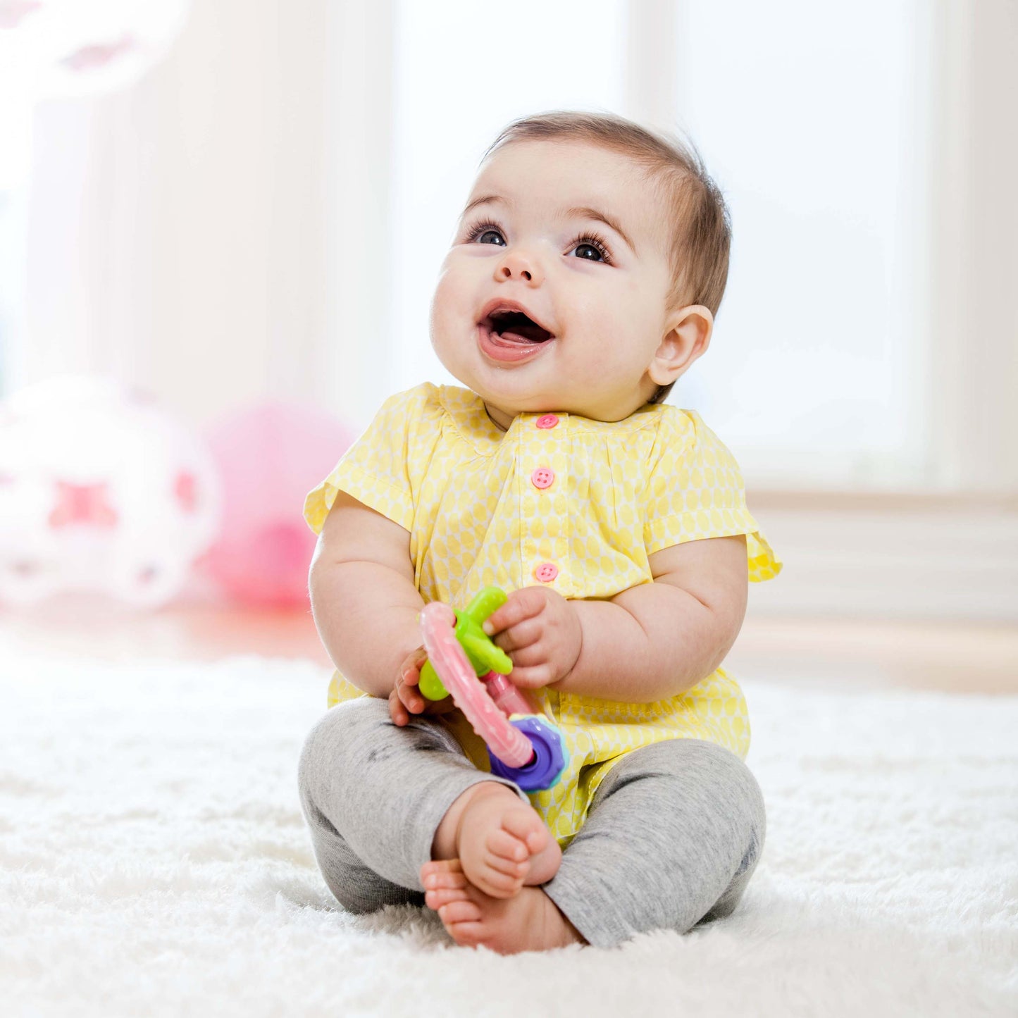INFANTINO CHEW & PLAY RING TEETHER FOR BABY SUITABLE FROM 0 MONTHS-MULTICOLOR