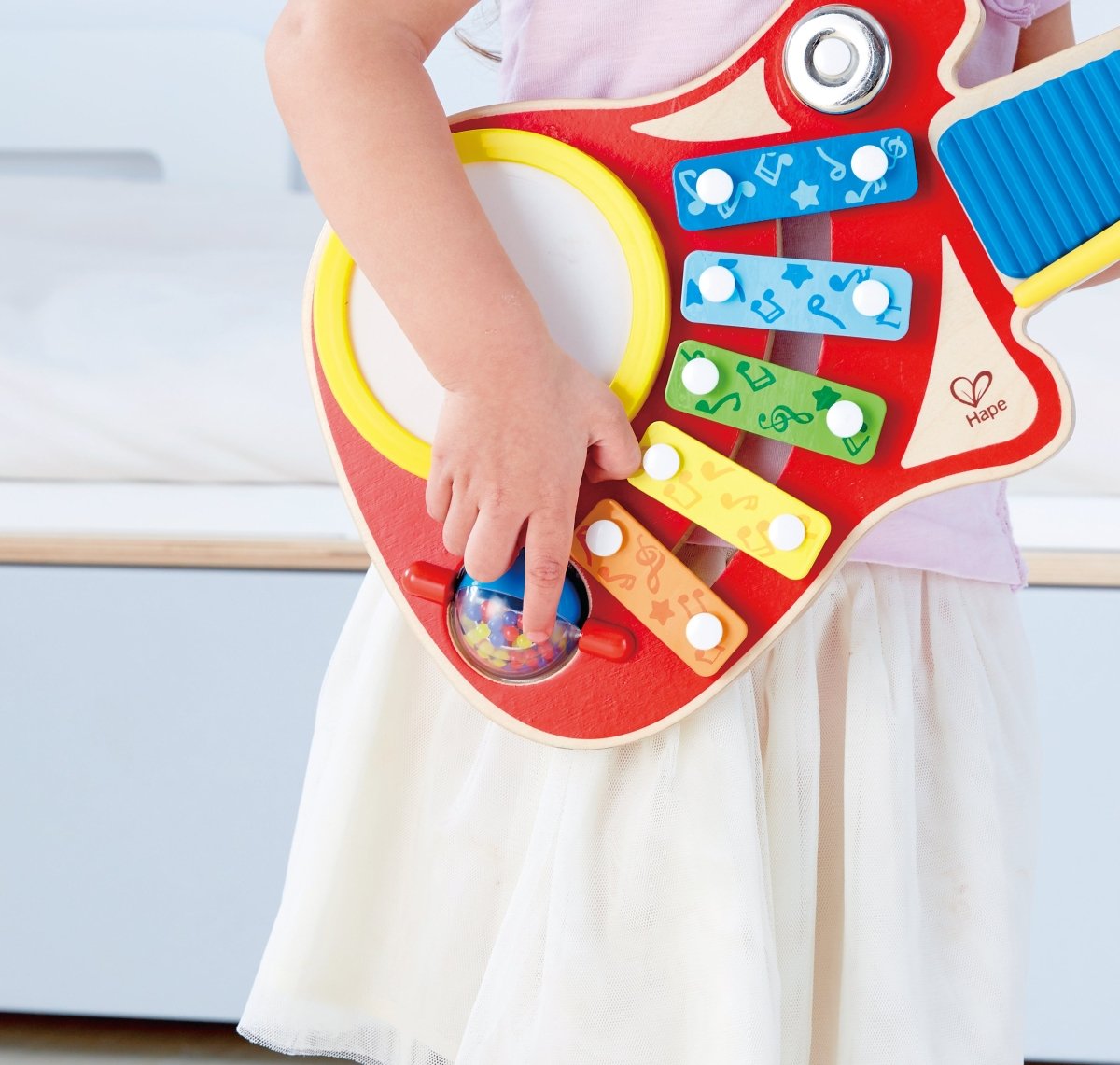 Hape - 6 - in - 1 Wooden Guitar - Shaped Music Maker Toy - Premium for Kids in Qatar | Toysaro.com