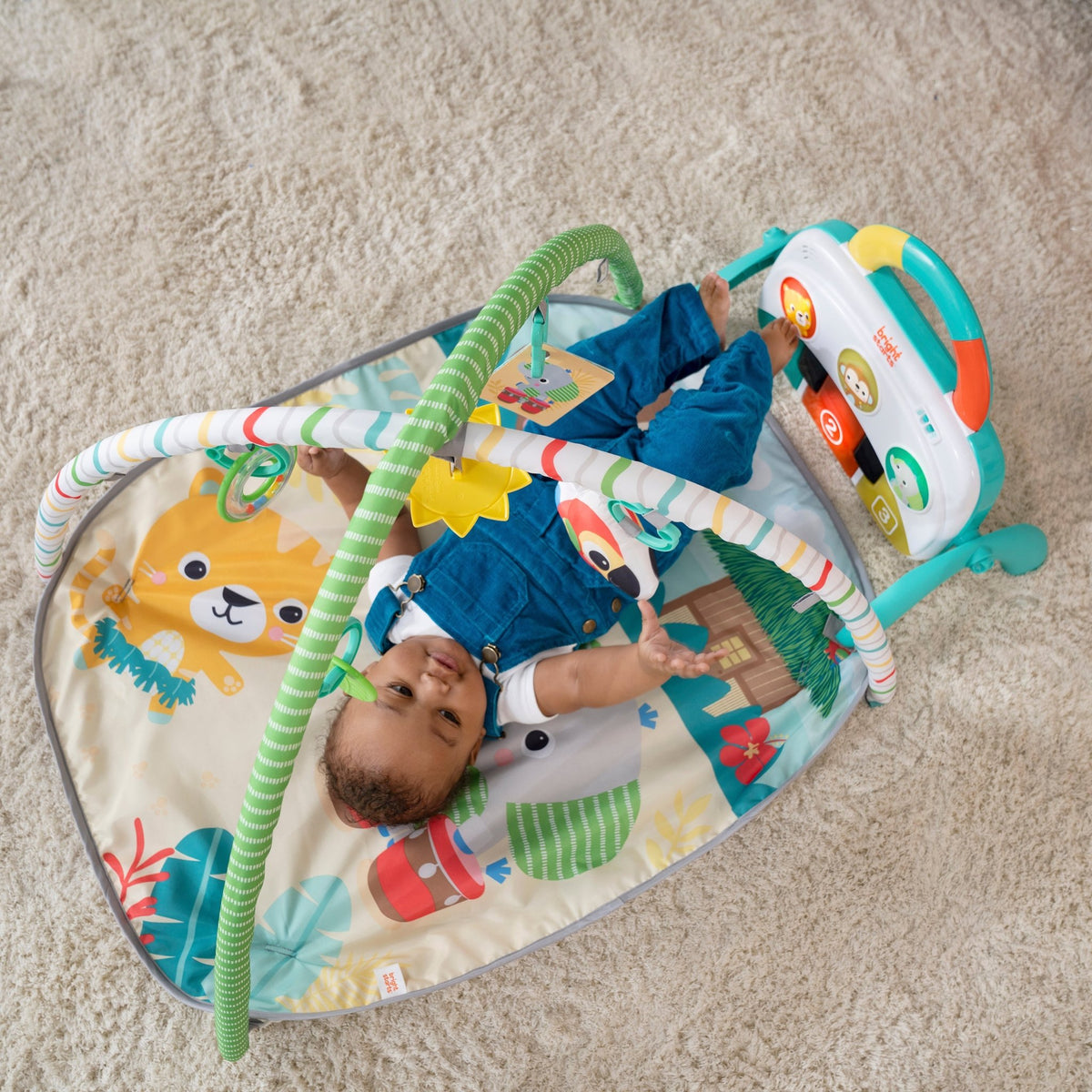 Bright Starts 4 - in - 1 Groovin’ Kicks Piano & Drum Kick Gym - Tropical Safari - Premium for Kids in Qatar | Toysaro.com