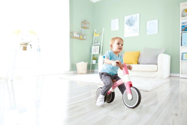 Hape Toddler Ride On Balance Bike| Adjustable and Lightweight No - Pedal Training Bike | with Silent Non - Marking Wheels | Light Pink, for Toddlers 12 Months+ - Premium for Kids in Qatar | Toysaro.com
