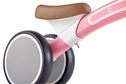 Hape Toddler Ride On Balance Bike| Adjustable and Lightweight No - Pedal Training Bike | with Silent Non - Marking Wheels | Light Pink, for Toddlers 12 Months+ - Premium for Kids in Qatar | Toysaro.com